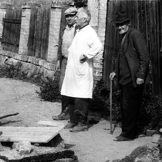 Destruction and reconstruction in a damaged street.