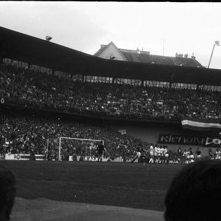 Crowded stadium during a soccer match.
