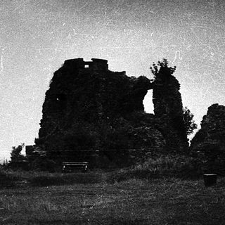 Ruins of an old stone castle silhouette.