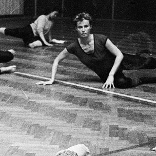 Women participating in a yoga or stretching class.