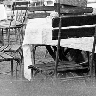 People dining outdoors at a café.