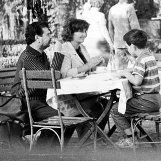 People dining outdoors at a café.