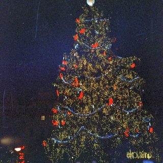 Elaborate illuminated Christmas tree decoration.