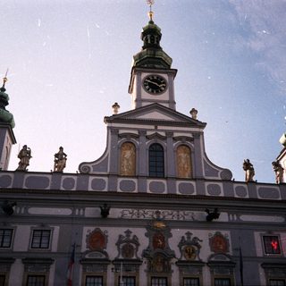 Baroque-style town hall with clock tower.