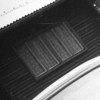 Vintage car with slatted roof.