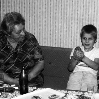 Family gathering at a meal indoors.