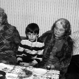 Family gathering indoors during a festive meal.