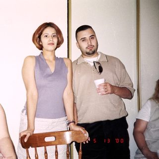 Group of people indoors at an event.