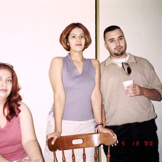 Group of people indoors at an event.