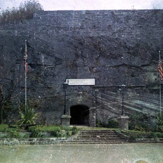 Stone entrance to underground tunnel or bunker.