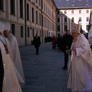 Religious procession with clergy in liturgical vestments.