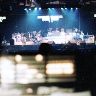 Live band performing on stage.