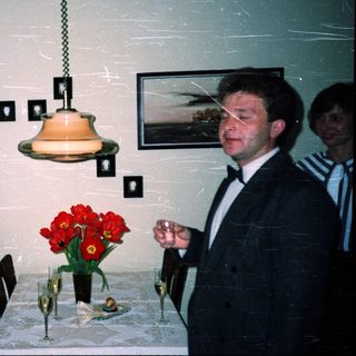 Business event with men toasting indoors.