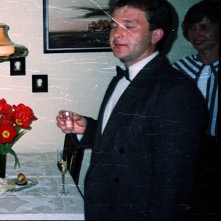 Business event with men toasting indoors.