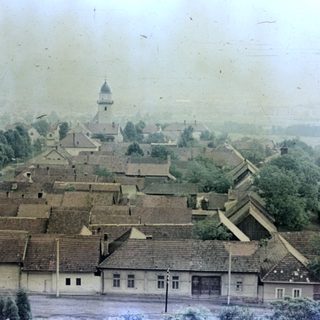 Aerial view of a small, old European village.