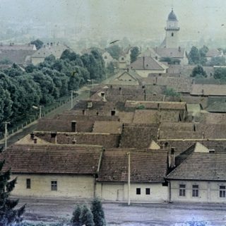 Aerial view of a small, old European village.