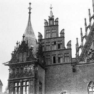 Black and white photo of ornate, historic building architecture.