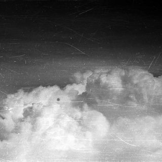 Cloud formation captured in a vintage, grayscale photograph.