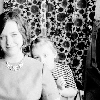 Woman and child portrait, vintage black and white photography.
