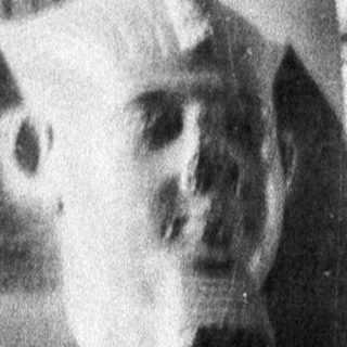 Black and white photo depicts an ancient Egyptian sphinx statue.