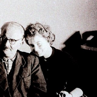 Einstein, Bohr, and Pauli photographed together in a seated group.