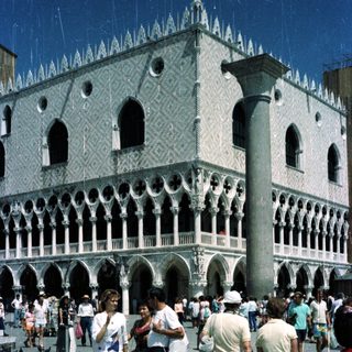 People walk near the Doge's Palace in Venice, Italy.