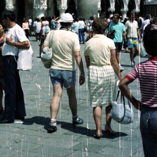 People walk near the Doge's Palace in Venice, Italy.