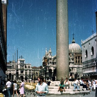 Man walks past St. Mark's Square in Venice, Italy.
