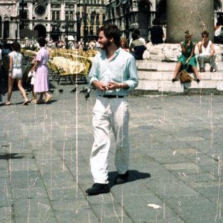 Man walks past St. Mark's Square in Venice, Italy.