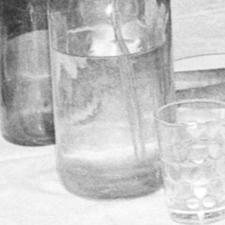 Group at a formal dinner, toasting with champagne.
