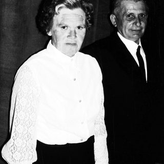 Black and white portrait of a woman and man.