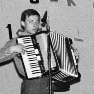 Accordionist and bassist perform on stage, 1972.