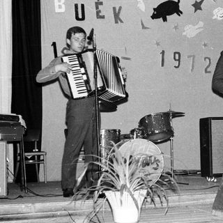 Accordionist and bassist perform on stage, 1972.