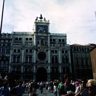 Crowded square with impressive architecture in Venice, Italy.