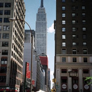 Street scene in New York City with the Empire State Building.