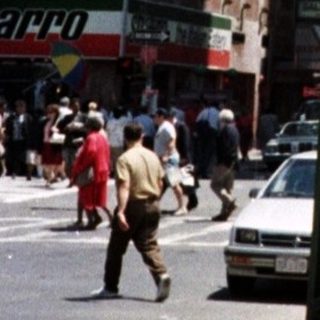 Street scene in New York City with the Empire State Building.