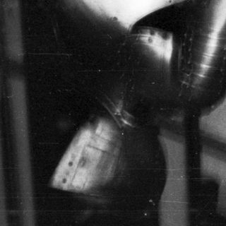 Here's a brief summary: Close-up of a person in medieval plate armor.
