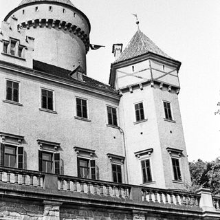 Black and white image of a castle with towers.