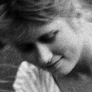 Diana, Princess of Wales, sits on a boat.