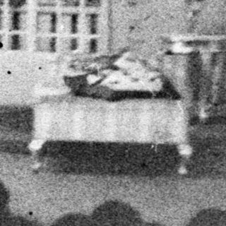 Black and white photograph of a room set design.