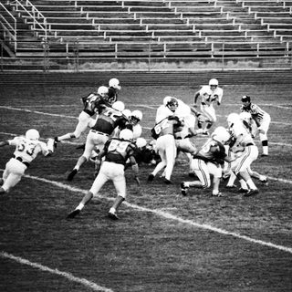 American football players in action during a game.