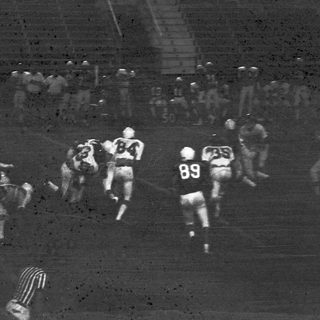 American football players in action during a game.