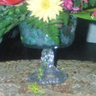 Elegant floral arrangement in vintage indoor setting.