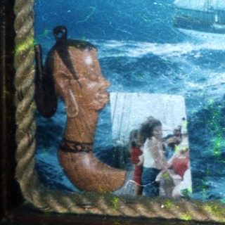 Maritime painting with sailing ship and coastal scene.