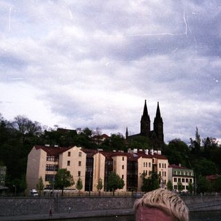 Historic European cityscape with cathedral spires.