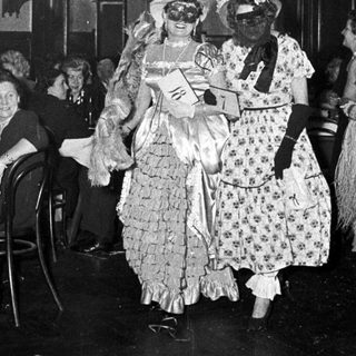 Costumed women participating in a 1950s-style event.