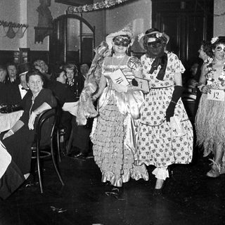Costumed women participating in a 1950s-style event.