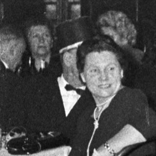 Costumed women participating in a 1950s-style event.
