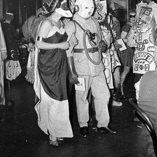 Costumed characters in a festive or theatrical event.
