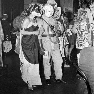 Costumed characters in a festive or theatrical event.